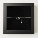 دستبند نقره دخترانه مدل دو قلب نگین دار با آویز