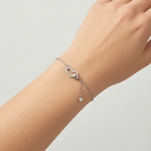 دستبند نقره دخترانه مدل دو قلب نگین دار با آویز