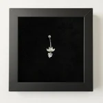 پیرسینگ ناف نقره قلبی تاج دار پُر نگین